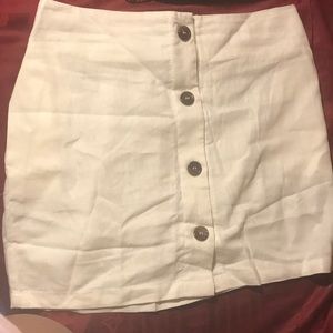 A white linen mini skirt
